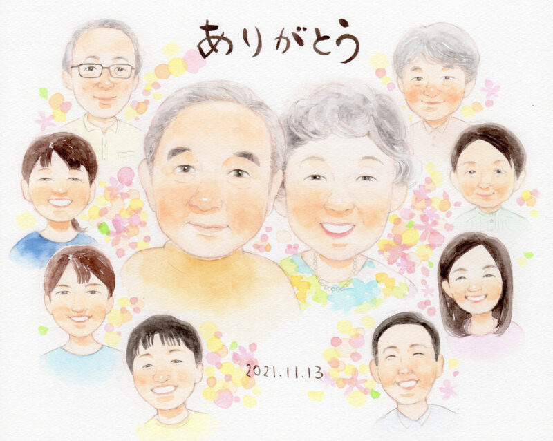 似顔絵を手にしたお客様のお喜びの写真
