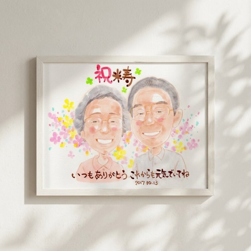 似顔絵を手にしたお客様のお喜びの写真