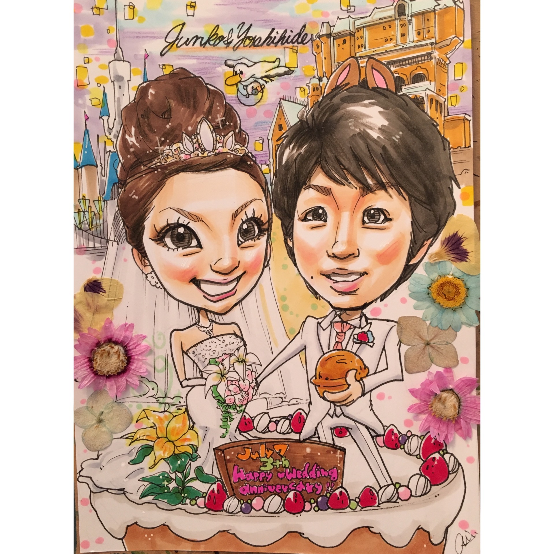3周年の結婚記念日に、お祝いのケーキの上に乗ったご夫婦がディズニーのチップとデールの変装をした似顔絵